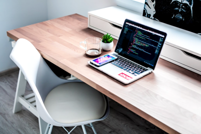 Laptop on wooden desk